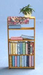 Fabric Shelving With Quilt & Plant